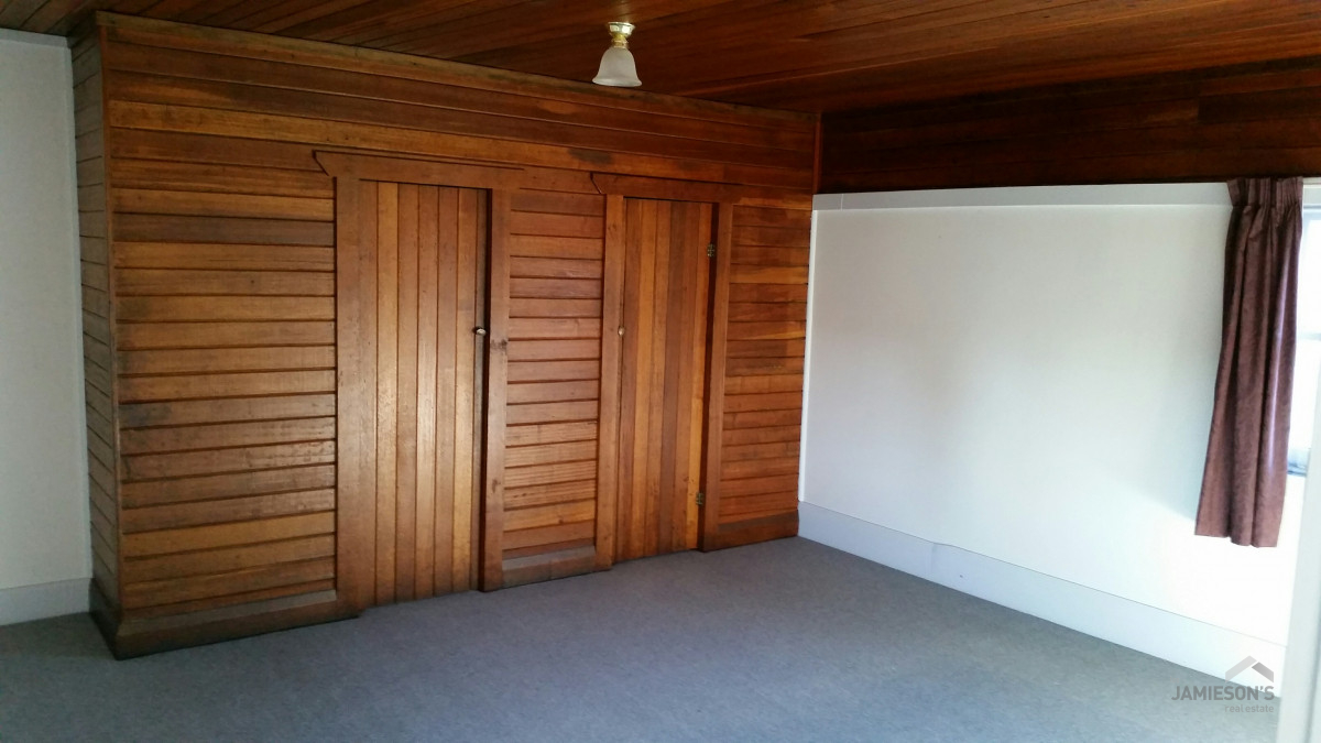 compact 2 bedroom unit in the heart of Westbury Lee Jamieson's Real