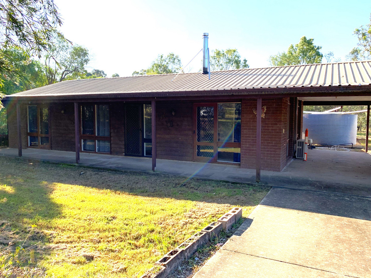 Three bedroom home on 5 acres in quiet area C1 Realty