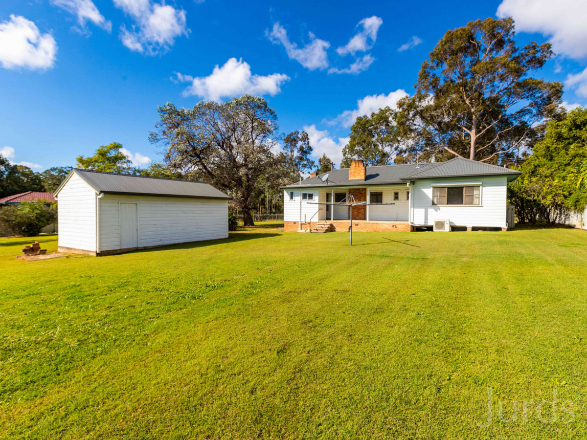 HOUSE ON HALF AN ACRE