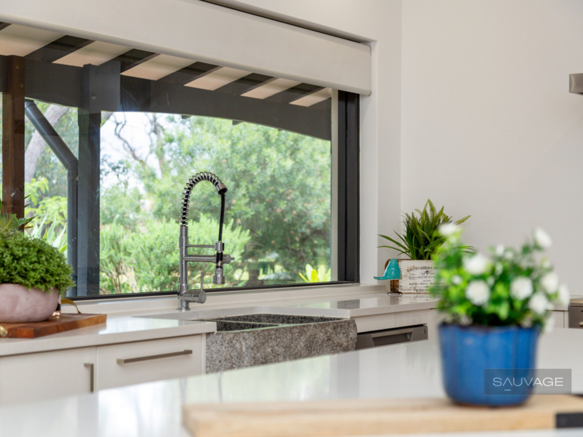 LOVELY HOME OVERLOOKING HALLS HEAD GOLF COURSE Sauvage Properties