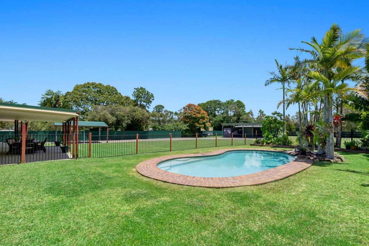 HOME ON A FULL ACRE IN PRESTIGIOUS 'RACECOURSE' ESTATE • Caloundra City