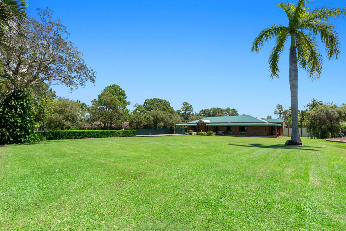 HOME ON A FULL ACRE IN PRESTIGIOUS 'RACECOURSE' ESTATE • Caloundra City